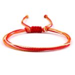 Bransoletka sznurkowa kolory czerwono pomarańczowo biały